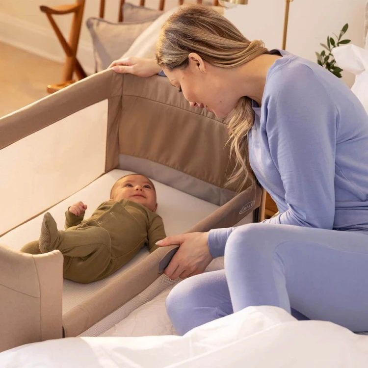 GRACO_en-graco-sweet2sleep-dropdown-rail-mum-with-baby-feat2.jpg