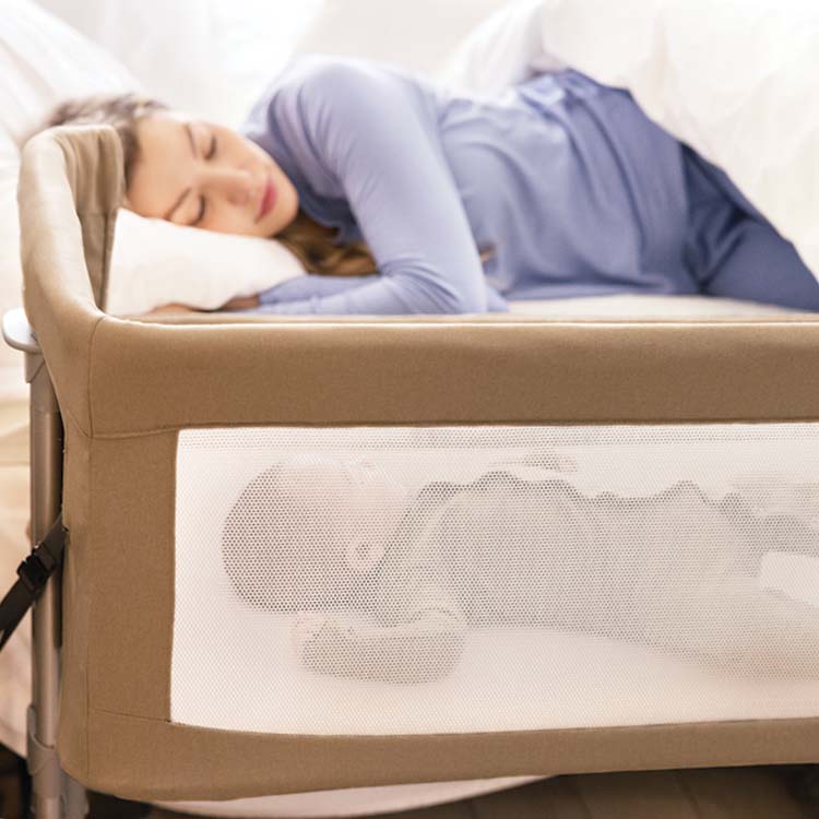 GRACO_en-graco-sweet2sleep-mum-sleeping-next-to-baby-feat4.jpg