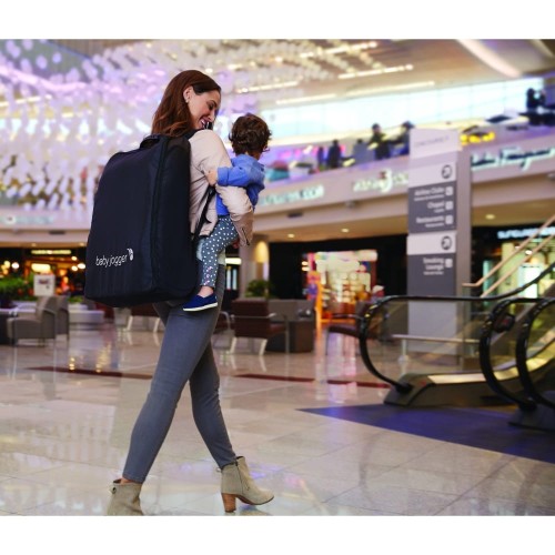 BABY_JOGGER_6JP00-baby-jogger-city-tour-stroller-folded-backpack-mall-in-use.jpg