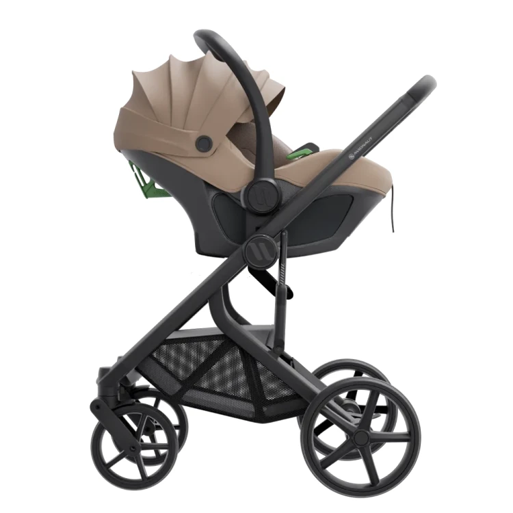 Fotelik-dla-noworodka-avionaut-pixel-3-wpięty-na-stelaż-wózka-widok-z-boku-kolor-beige