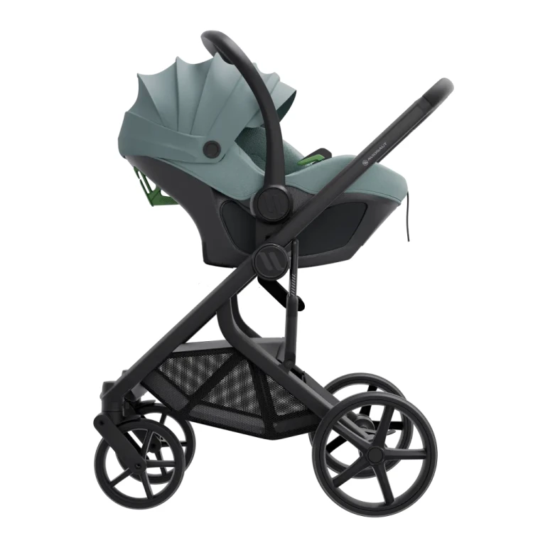 Fotelik-dla-noworodka-avionaut-pixel-3-wpięty-na-stelaż-wózka-widok-z-boku-kolor-mint